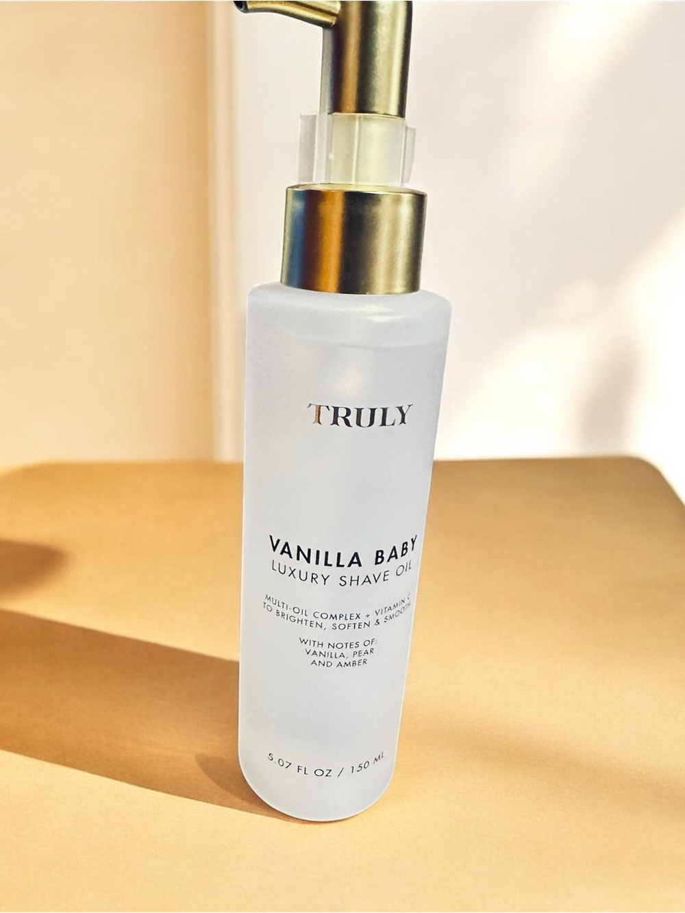 TRULY Vanilla Baby Luxury Shave Oil — White Bottle with Gold Pump